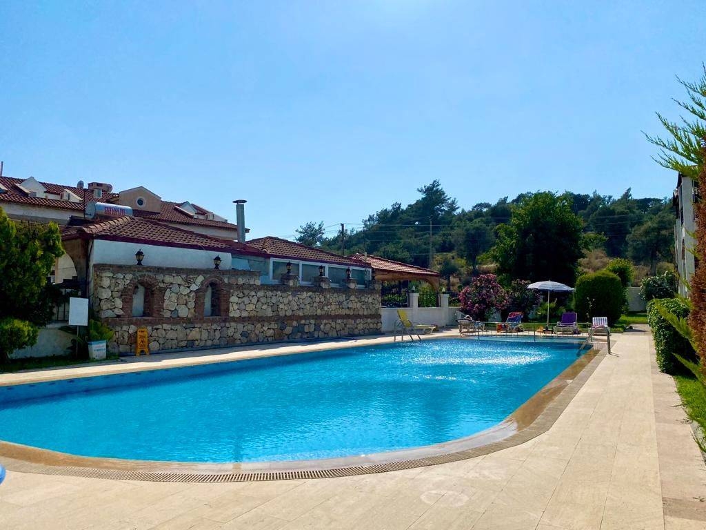 Fethiye Ölüdeniz'de Merkezi Konumda, Ortak Havuzlu, Konforlu Suit