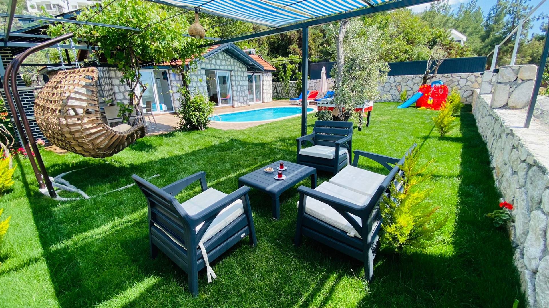 Kaş Üzümlü'de Taş Mimarili, Özel Havuzlu, Çocuk Oyun Alanlı Villa