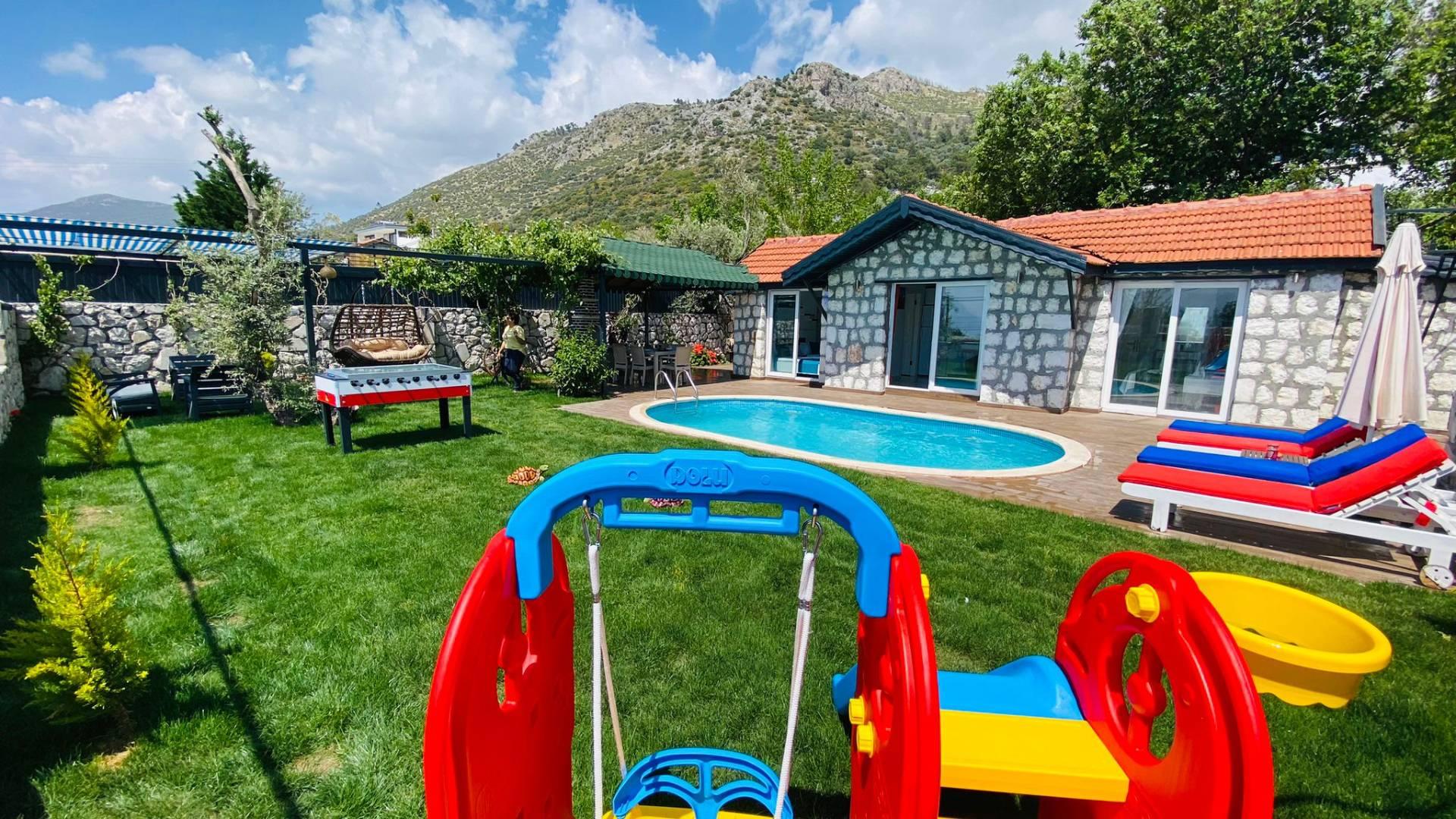 Kaş Üzümlü'de Taş Mimarili, Özel Havuzlu, Çocuk Oyun Alanlı Villa-42188